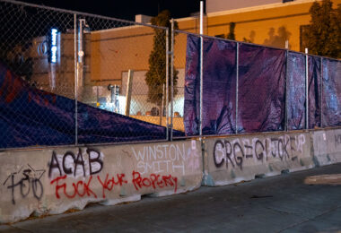 ACAB, Fuck Your Property, CRG=GI JOKE written on barricades outside the parking ramp that Winston Smith was killed by law enforcement in June 2021.