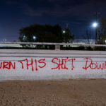 Graffiti reading "Burn this shit down" written in South Minneapolis on the 4 month anniversary of the death of Winston Smith.