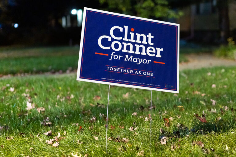 Clint Conner Mayoral Campaign Sign, Minneapolis 4 A lawn sign supporting Clint Conner’s mayoral campaign stands along a residential boulevard in Minneapolis. Conner, an attorney and political newcomer, ran on a platform focused on public safety reforms, neighborhood-level engagement, and governance changes within the city’s mayor–council structure. Yard signs like this became common across parts of Minneapolis during the campaign cycle, reflecting heightened civic interest following several years of intense debate over public safety, police restructuring, and the future of city governance.Municipal elections in Minneapolis often draw regional attention due to the city’s distinctive political climate, strong neighborhood identities, and history of competitive mayoral contests. Candidate signage has long been a visible part of the city’s election seasons—especially in the years after 2020, when local races increasingly intersected with national conversations about public policy and urban leadership.