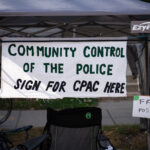 CPAC tent at Lyndale Avenue Open Streets 2021.“Community Control of the police”“Sign for CPAC here”