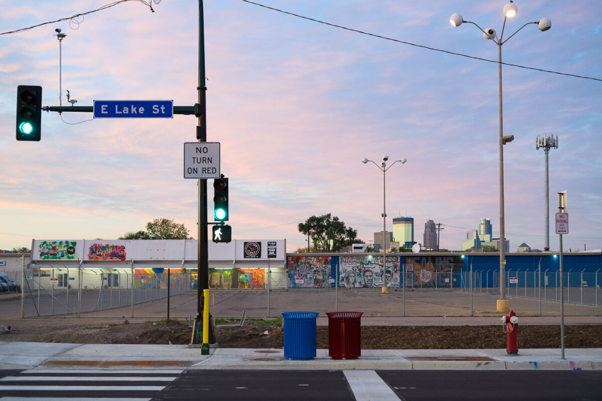 Downtown Minneapolis seen behind fenced in K-Mart