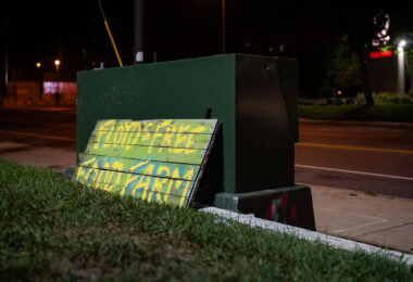 "Floyd's Free Food Farm" sign seen near the Minneapolis police third precinct police station.