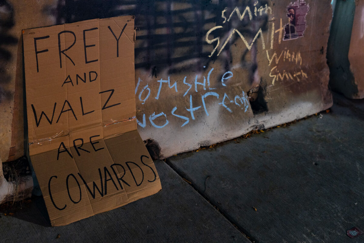 Frey and Walz are Cowards protest sign