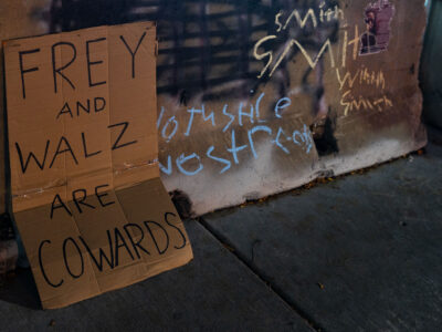 Uptown Minneapolis Protest Sign: Frey and Walz Are Cowards