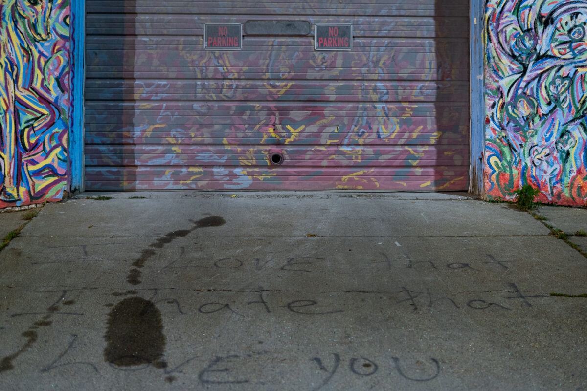 "I love that I hate that I love you" seen on the ground at George Floyd Square.