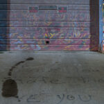 "I love that I hate that I love you" seen on the ground at George Floyd Square.