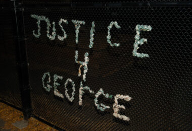 "Justice 4 George" yarn art on fencing at Lake Country School in South Minneapolis.