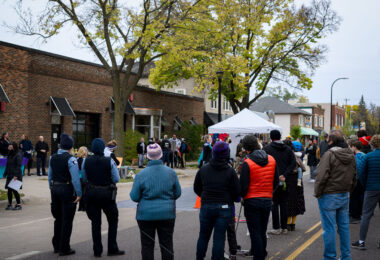 Minneapolis Police watch as dancers perform at Open Streets Minnehaha.