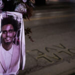 A memorial for Dolal Idd. Idd was shot and killed by Minneapolis Police on the day before New Years Eve after they say he fired at them first while in his car at a Holiday Gas Station.