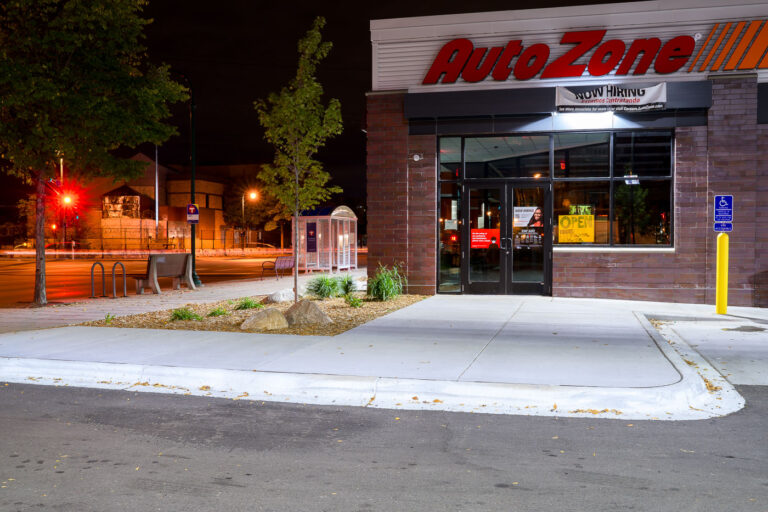 Rebuilt AutoZone With Open Sign 1 AutoZone on East Lake St open for business after being the first building to burn during the Minneapolis Uprising.