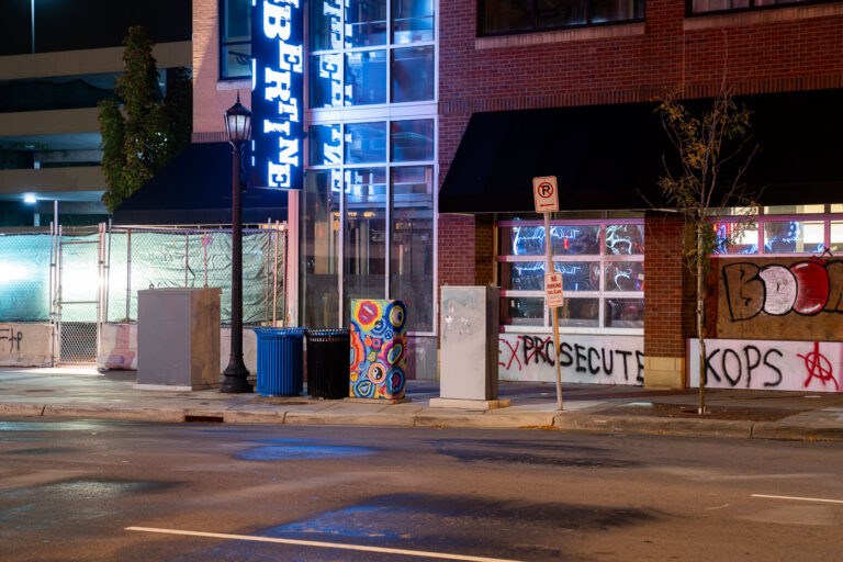 Libertine at Seven Points Mall 4 Outside of the parking garage where Winston Smith was killed on June 3rd. New security fencing and wrap installed.