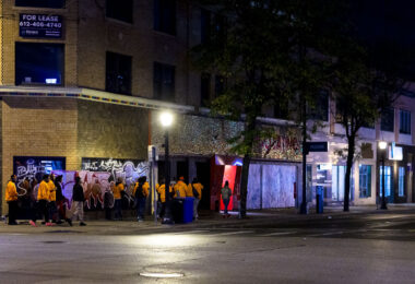 "Outreach" workers walking in Uptown Minneapolis.