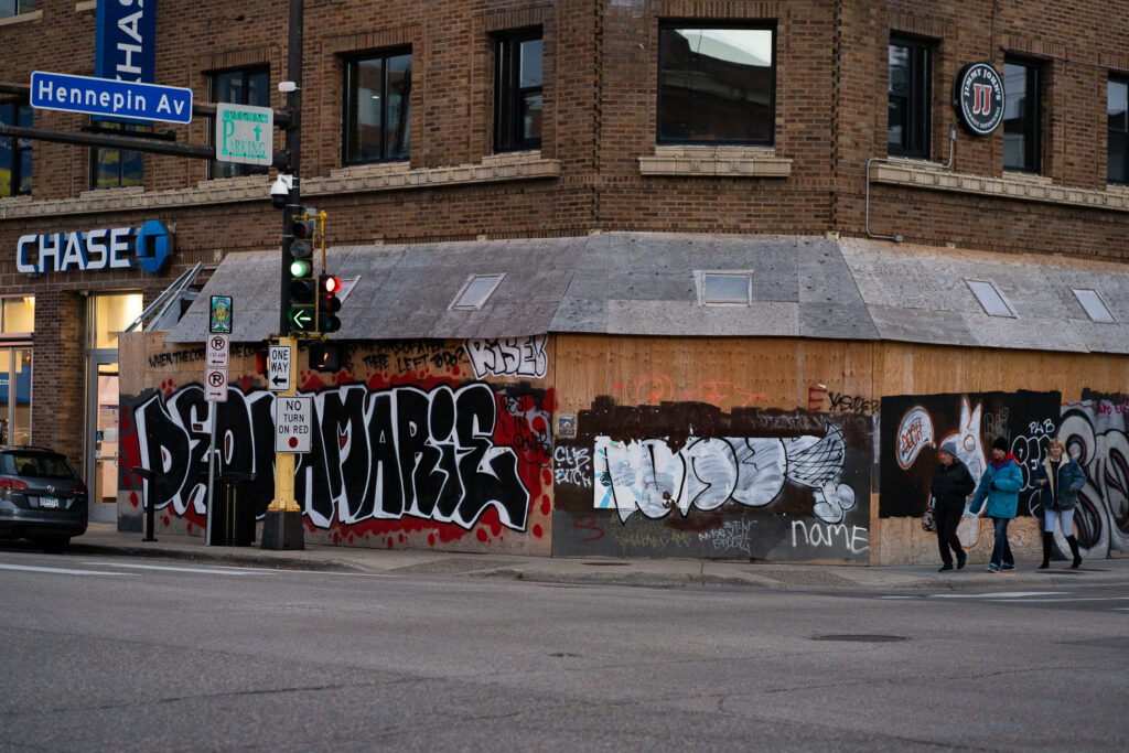 The corner of Hennepin Avenue and Lake Street in Uptown Minneapolis. Deona Marie written on boards around the Seven Points Mall. Deona Marie, a protester, was killed on June 13th when a man drove his vehicle through barricades setup by those demonstrating over the law enforcement shooting death of Winston Smith ten days prior.
