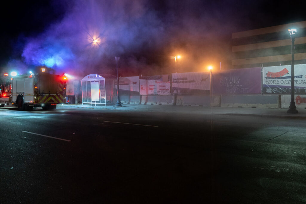 Minneapolis Fire Department puts out garbage can fires on Lake Street.
