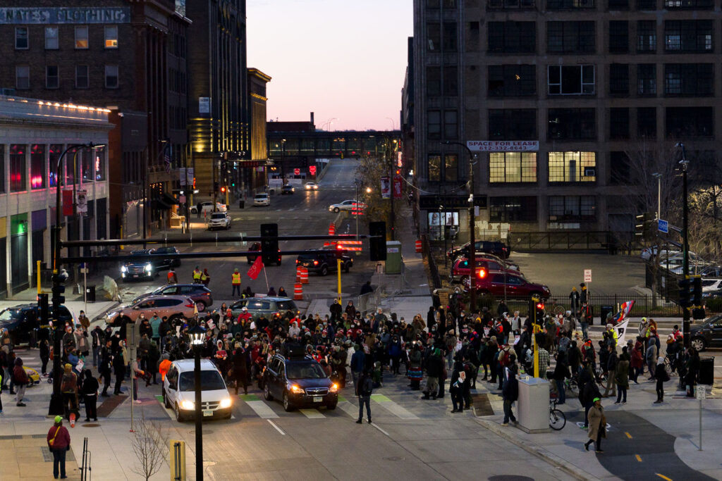 Protesters march through downtown Minneapolis the day after the Kyle Rittenhouse acquittal.
