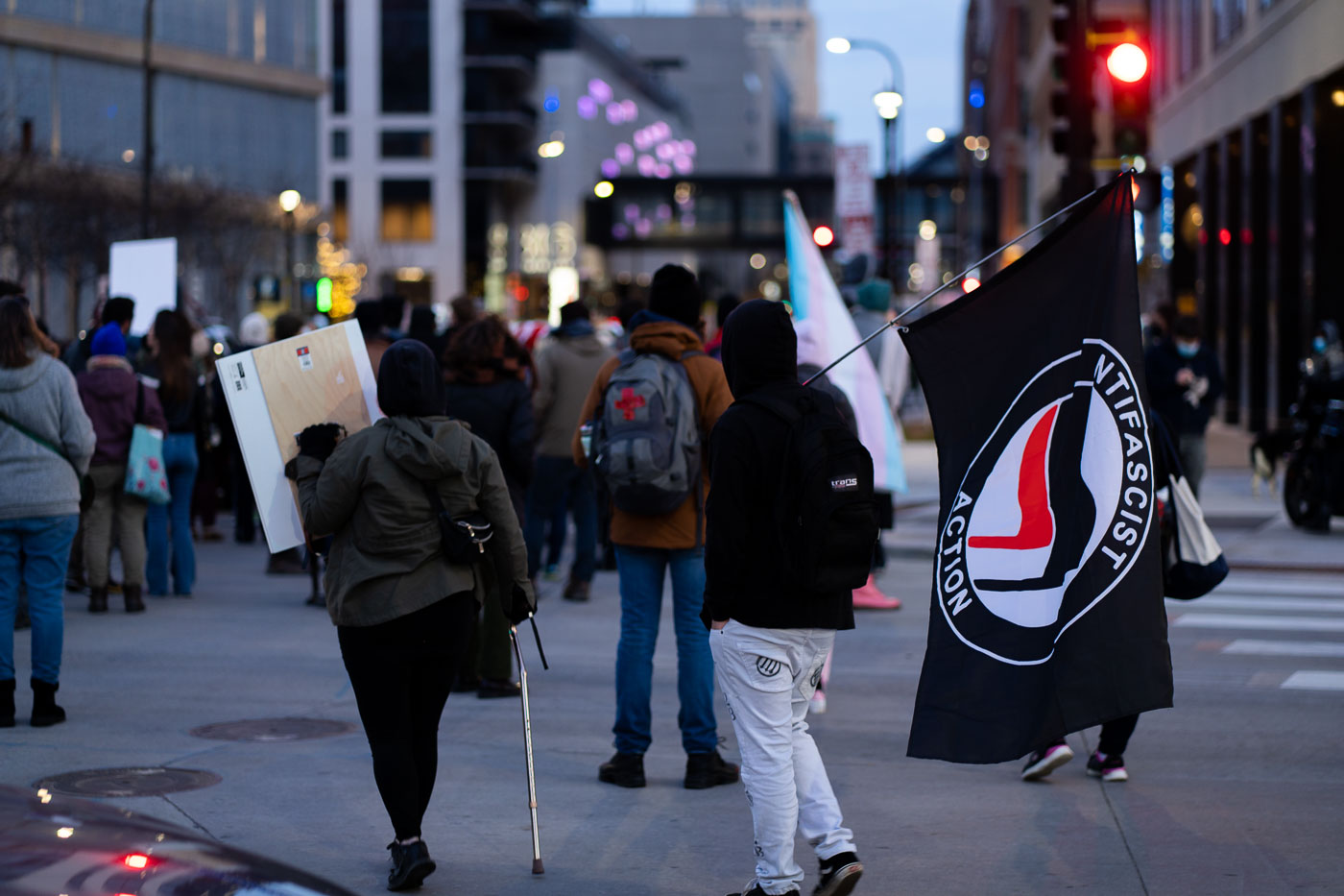 An Antifascist Action flag is carried during a protest in downtown Minneapolis following the Kyle Rittenhouse verdict in November 2021.
