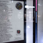 A poem written by Anthony Ceballos on a Hennepin Ave storefront.