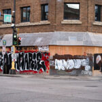The corner of Hennepin Avenue and Lake Street in Uptown Minneapolis. Deona Marie written on boards around the Seven Points Mall. Deona Marie, a protester, was killed on June 13th when a man drove his vehicle through barricades setup by those demonstrating over the law enforcement shooting death of Winston Smith ten days prior.