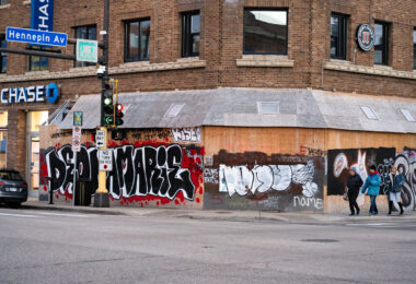 The corner of Hennepin Avenue and Lake Street in Uptown Minneapolis. Deona Marie written on boards around the Seven Points Mall. Deona Marie, a protester, was killed on June 13th when a man drove his vehicle through barricades setup by those demonstrating over the law enforcement shooting death of Winston Smith ten days prior.