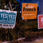 Londel French, Risa Hosted, and Question 1 2 and 3 yard signs in Minneapolis.