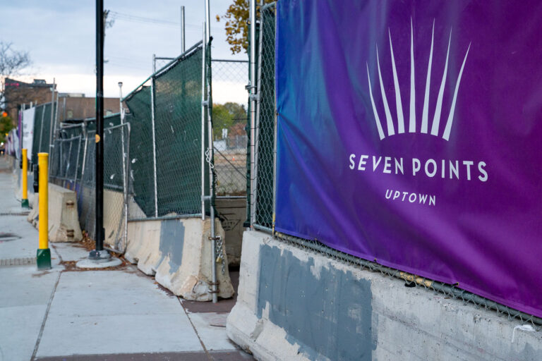 Fencing around Seven Points at Lake and Girard 4 Security fencing and signage on the Seven Points mall parking garage.