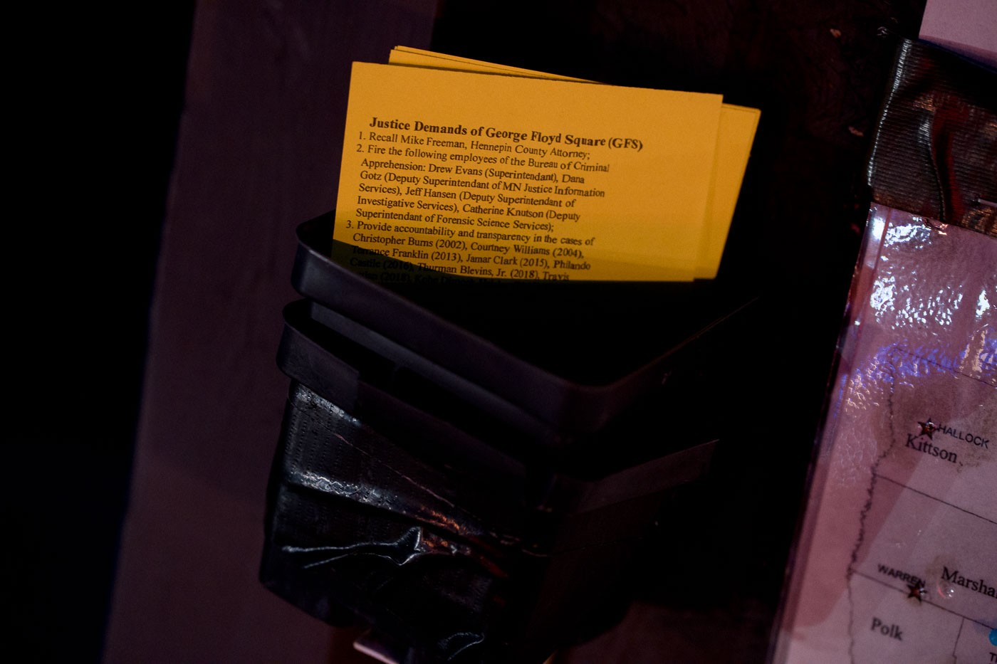 Yellow cards list Justice Demands of George Floyd Square (GFS) in Minneapolis, including calls for accountability within the legal and law enforcement systems.