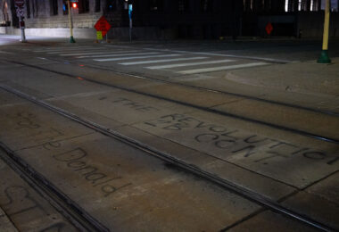 Graffiti on Light Rail tracks outside the Hennepin County Public Safety Facility.