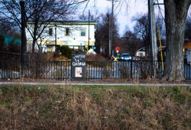 A utility box with "Justice 4 George" written on it near 38th street in South Minneapolis.