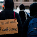 Protesters march after a rally at the Hennepin County Government Center. A day earlier, Kyle Rittenhouse was found not guilty on all charges.