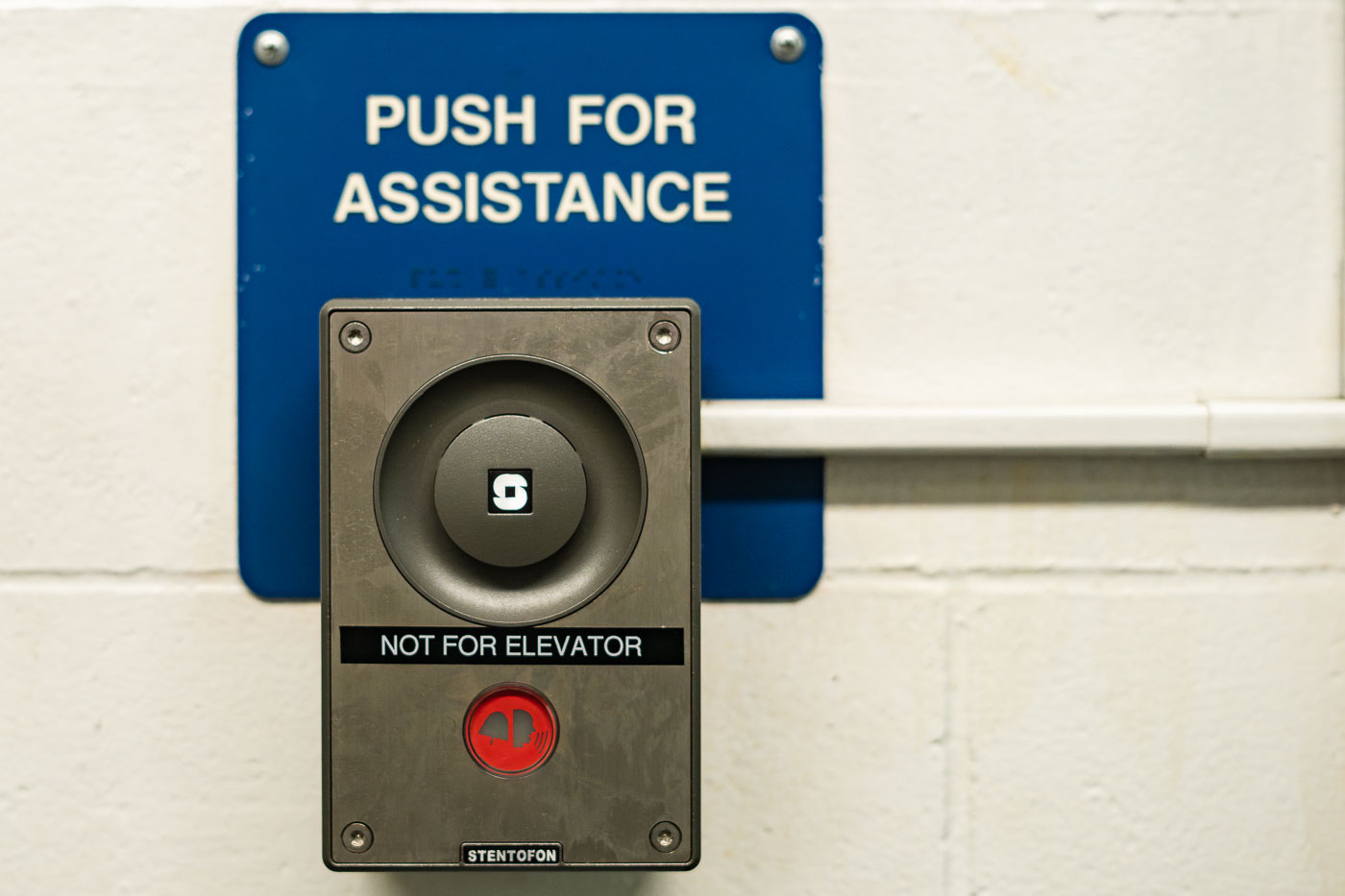 Minneapolis parking garage assistance button, marked "PUSH FOR ASSISTANCE" and "NOT FOR ELEVATOR", provides emergency communication.