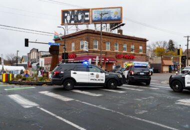 Minneapolis Police and Rescue respond to a man having a medical emergency as he drove through the east side fist. No one on the scene was injured.