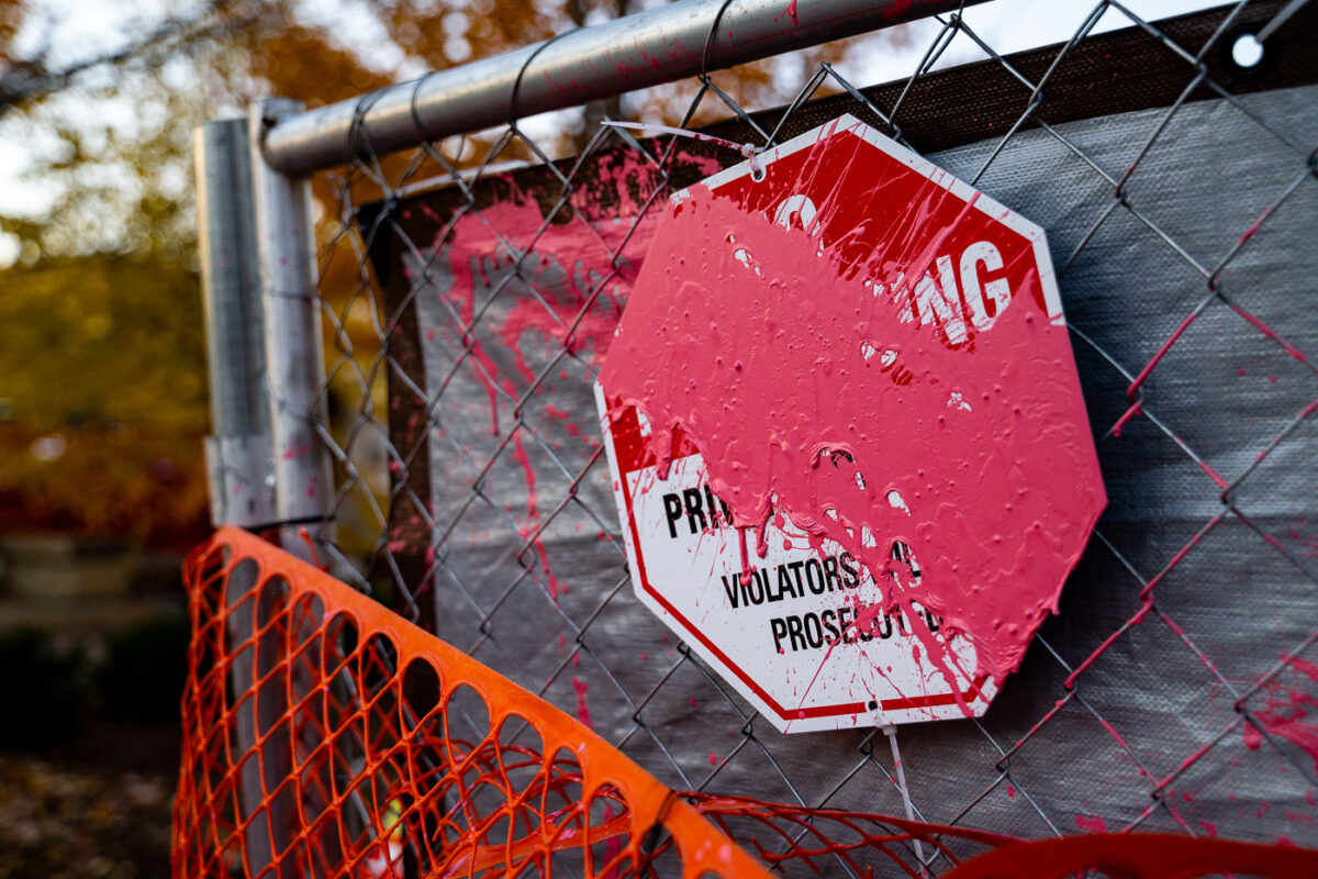 A paint covered No Trespassing sign outside the parking ramp where Winston Smith was killed by law enforcement on June 3, 2021.