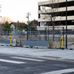 Security fences around the Lake & Girard parking garage where Winston Smith was killed by law enforcement in June.