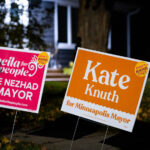 Yard signs for Kate Knuth and Sheila Nezhad together in a South Minneapolis yard.  Both with "Don't Rank Frey" stickers attached, referring to current Minneapolis Mayor Jacob Frey. Election in 2 days.