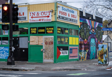 Southside Food & Deli on Chicago Avenue in South Minneapolis with boards and a Free Palestine flag.