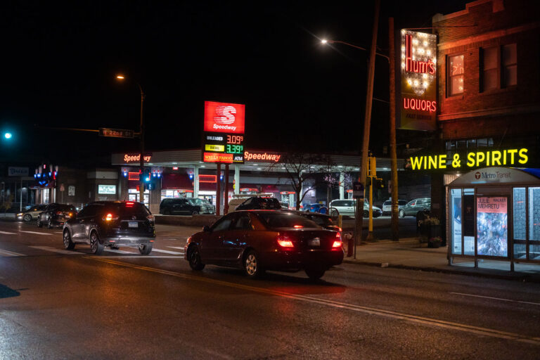 Speedway Gas Station and Wine & Spirits on Lyndale Ave, Minneapolis 1 Speedway gas station and Hum's Liquors Wine & Spirits on Lyndale Ave, Minneapolis at night, with a Metro Transit bus shelter visible.