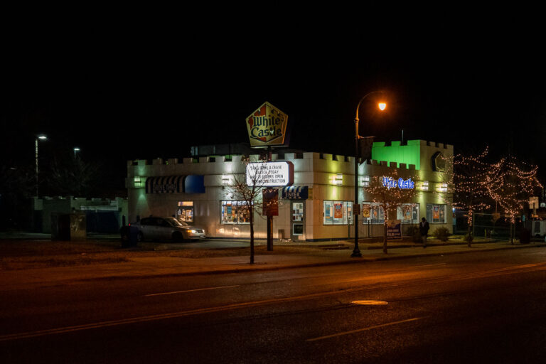 White Castle, Lake Street, Minneapolis at Night 1 The White Castle restaurant on Lake Street in Minneapolis is illuminated at night, featuring its signature crenellated facade.