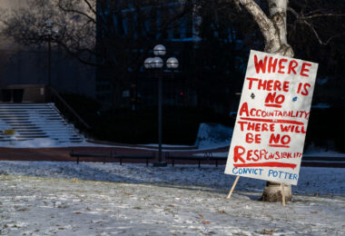 Outside the courthouse while the jury deliberates in the Kim Potter trial. 

Sign reading “Where there is no accountability there will be no responsibility. Convict Potter”.