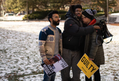 George Floyd's girlfriend Courteney Ross reacts along with activists outside the courthouse as the jury finds former Brooklyn Center police officer Kim Potter guilty on all counts of manslaughter in the death of Daunte Wright.