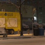 A Taco Taxi food truck on Lagoon Avenue in Uptown Minneapolis after a fresh snowfall.
