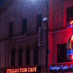 Stella's Fish Cafe restaurant on Lake Street in Uptown Minneapolis during a December snowfall.