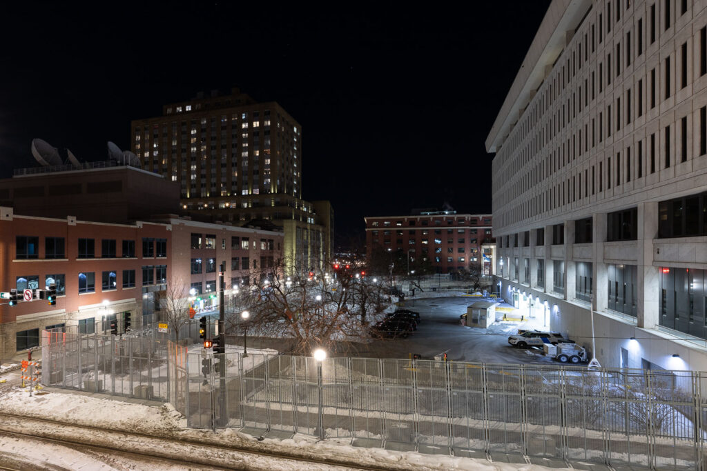 Security fencing around the Federal Courthouse in downtown St. Paul the night before jury selection begins in the trial of the Minneapolis Police Officers accused of violating George Floyd's civil rights.