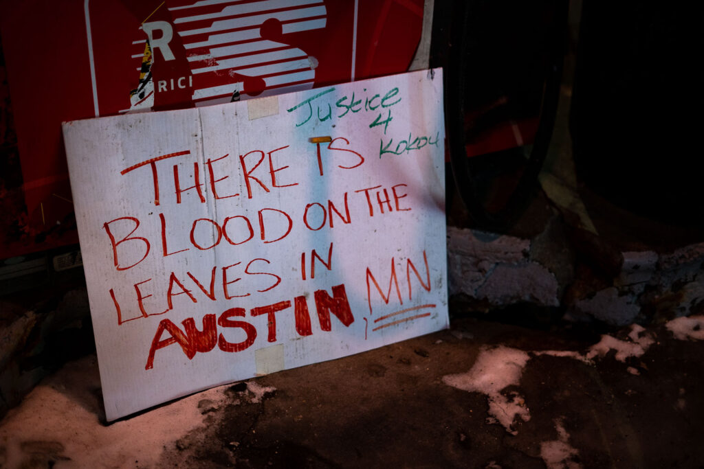 A sign at George Floyd Square mentioning Kokou Christopher Fiafonou. Fiafonou was shot and killed by law enforcement in Austin, Minnesota on December 23, 2021. Authorities said shortly after that Fiafonou was armed with a knife and was threatening others.