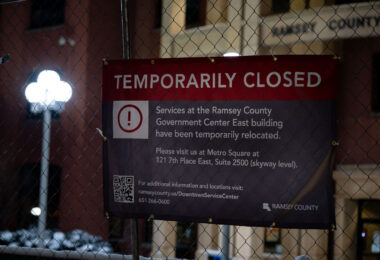 Fencing around the Ramsey County Downtown Service Center the night before opening statements in the federal trial of officers accused of violating George Floyd's civil rights.