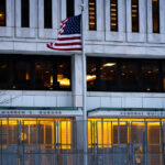 Flag hanging outside the Warren E. Burger Federal Building on Day 3 of the federal trial where Thou Thao, J Alexander Kueng and Thomas Lane are accused of violating George Floyd's civil rights.