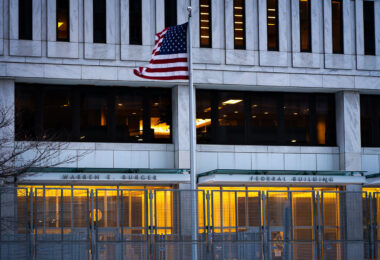 Flag hanging outside the Warren E. Burger Federal Building on Day 3 of the federal trial where Thou Thao, J Alexander Kueng and Thomas Lane are accused of violating George Floyd's civil rights.