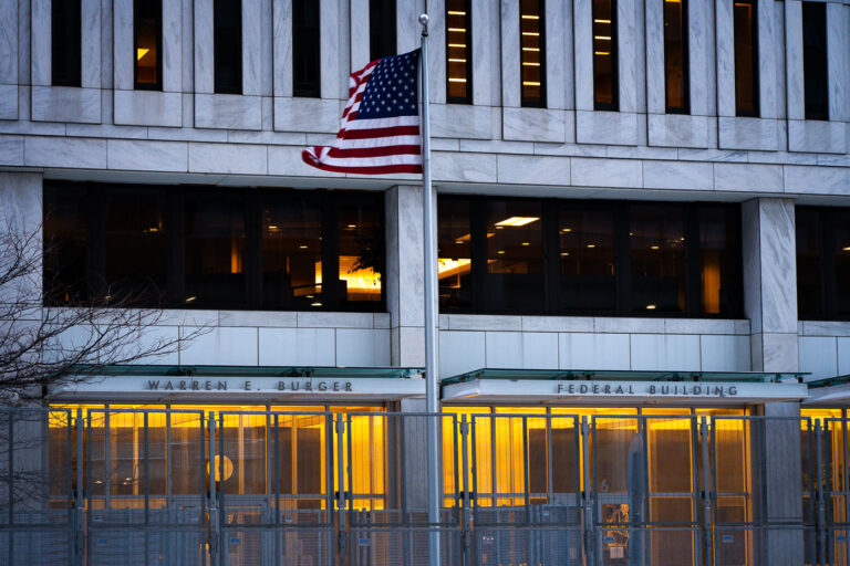 Flag at Warren Burger Federal Building 3 Flag hanging outside the Warren E. Burger Federal Building on Day 3 of the federal trial where Thou Thao, J Alexander Kueng and Thomas Lane are accused of violating George Floyd's civil rights.