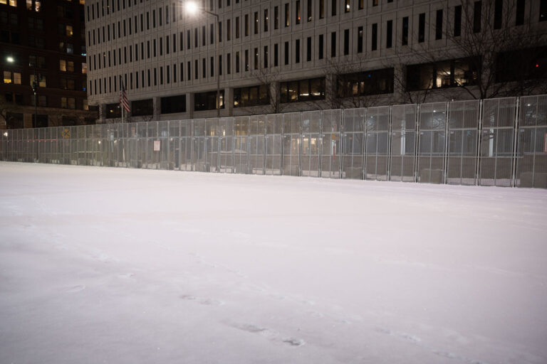 Fresh snow and security fencing at federal courthouse 1 Security around the Warren E. Burger Federal Building in downtown St. Paul the night before opening statements in the trial of the officers accused of violating George Floyd's civil rights.
