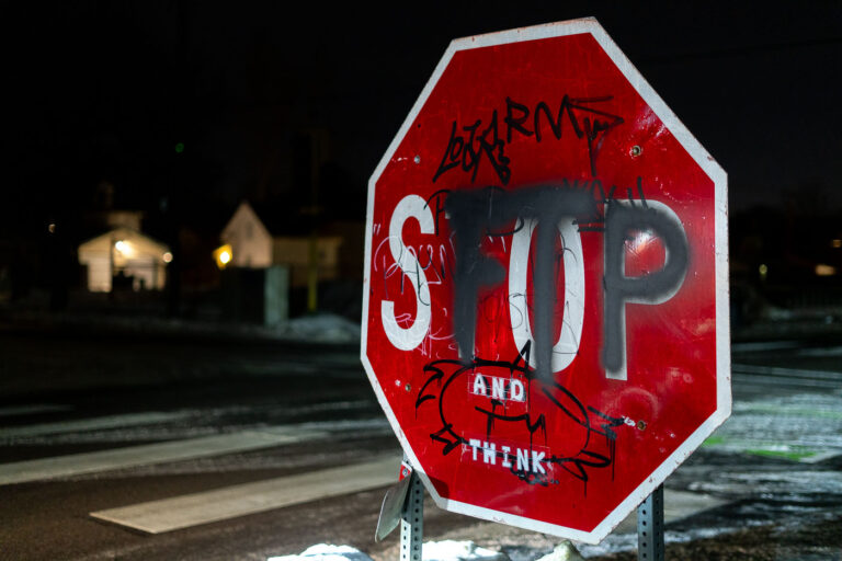 FTP Stop and Think Stop Sign 3 A stop sign with graffiti on it in Minneapolis. "FTP", standing for "Fuck The Police".