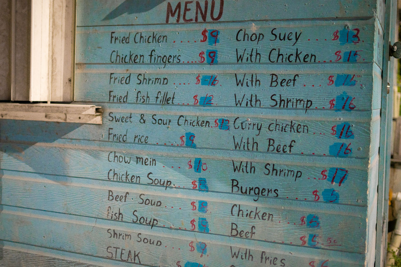 A menu in San Pedro Ambergris Caye, Belize.